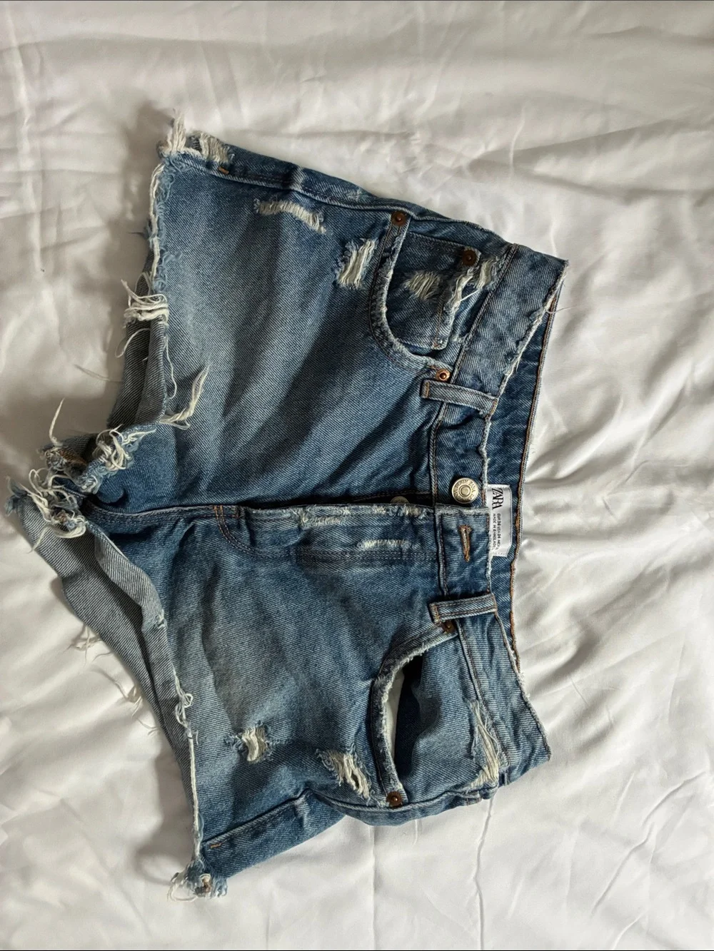 Zara Light Blue Distressed Denim Shorts